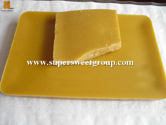 Bloque de cera de abeja pura natural orgánica amarilla cruda sin refinar Grado alimenticio de alta calidad Premium a granel Llama y pellets Bloque de cera de abeja pura